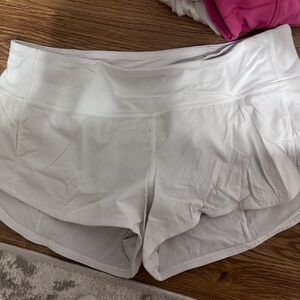 White Lululemon speed-up shorts